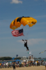 U.S. Army Parachute Team Golden Knight landing on North Avenue Beach